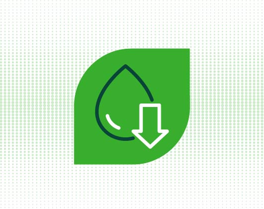 Green leaf-shaped icon featuring an outline of a water droplet and a downward arrow, representing reduced water consumption or environmental sustainability.