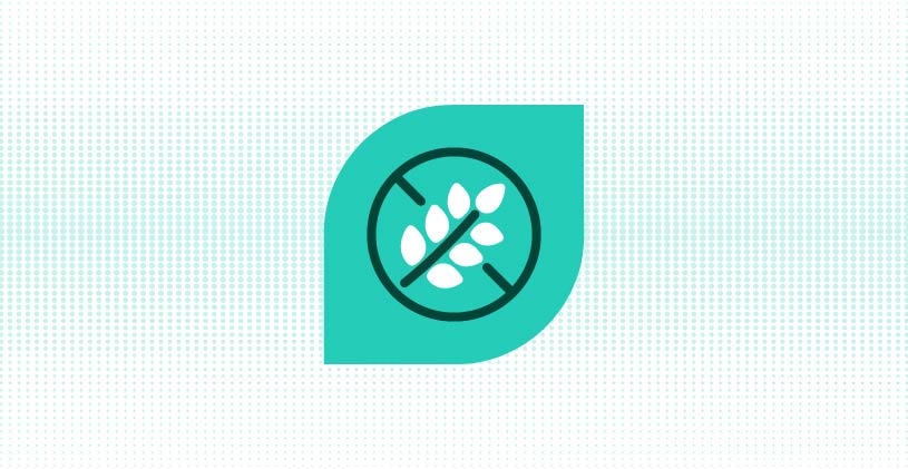 Icon showing a grain symbol crossed out inside a green leaf shape, representing a gluten-free or grain-free product.