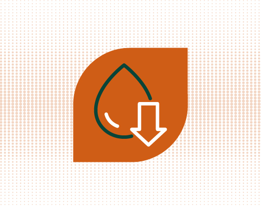 Orange leaf-shaped icon featuring a water droplet outline and a downward arrow, symbolising reduced moisture or water content.